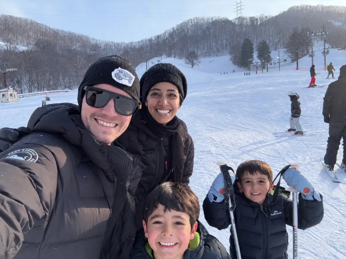 James and Delsey Neilson-Watt with their children on a ski trip